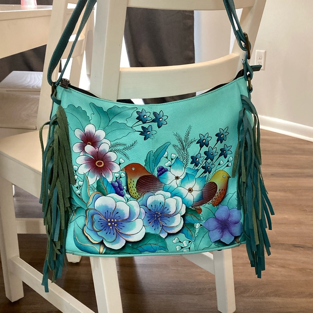 Excellent condition Anuschka Fringed Hobo bag.